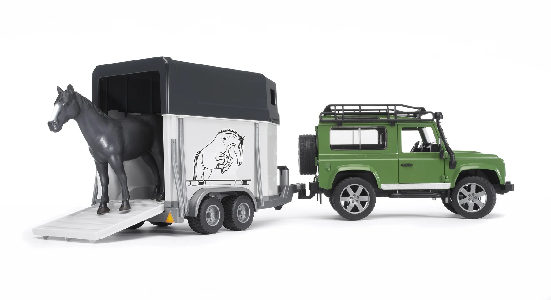 Bruder Land Rover Defender jeep i prikolica sa konjem 2592 u upotrebi